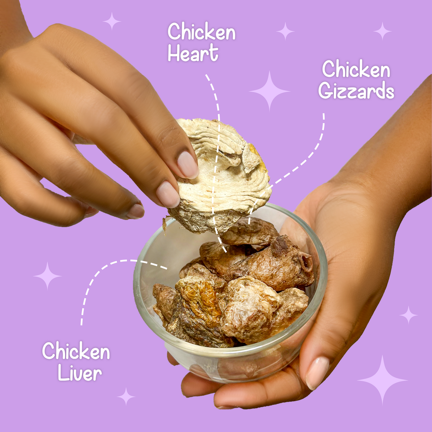 Glass bowl of BellePepper Chicken Lovers treats with one piece held up and text overlay listing ingredients: chicken heart, chicken liver, chicken gizzards